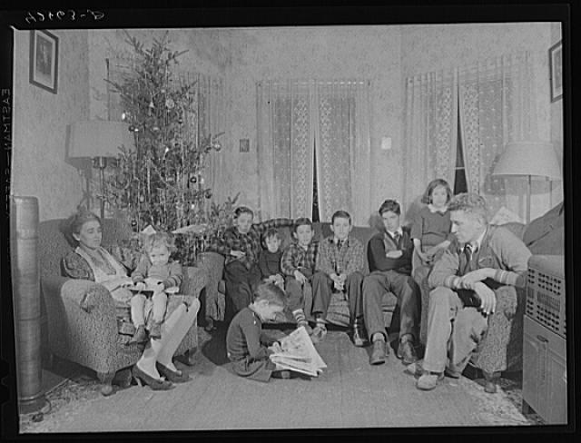 The family of John Kelly who works in the Navy yard in south Boston. Their present tenement in Quincy is completely inadequate. They have been unable to move because every real estate agent has turned him down, claiming there was no reason why they should rent to large families when there is such a great demand for decent houses by hundreds of incoming shipyard workers, 1940